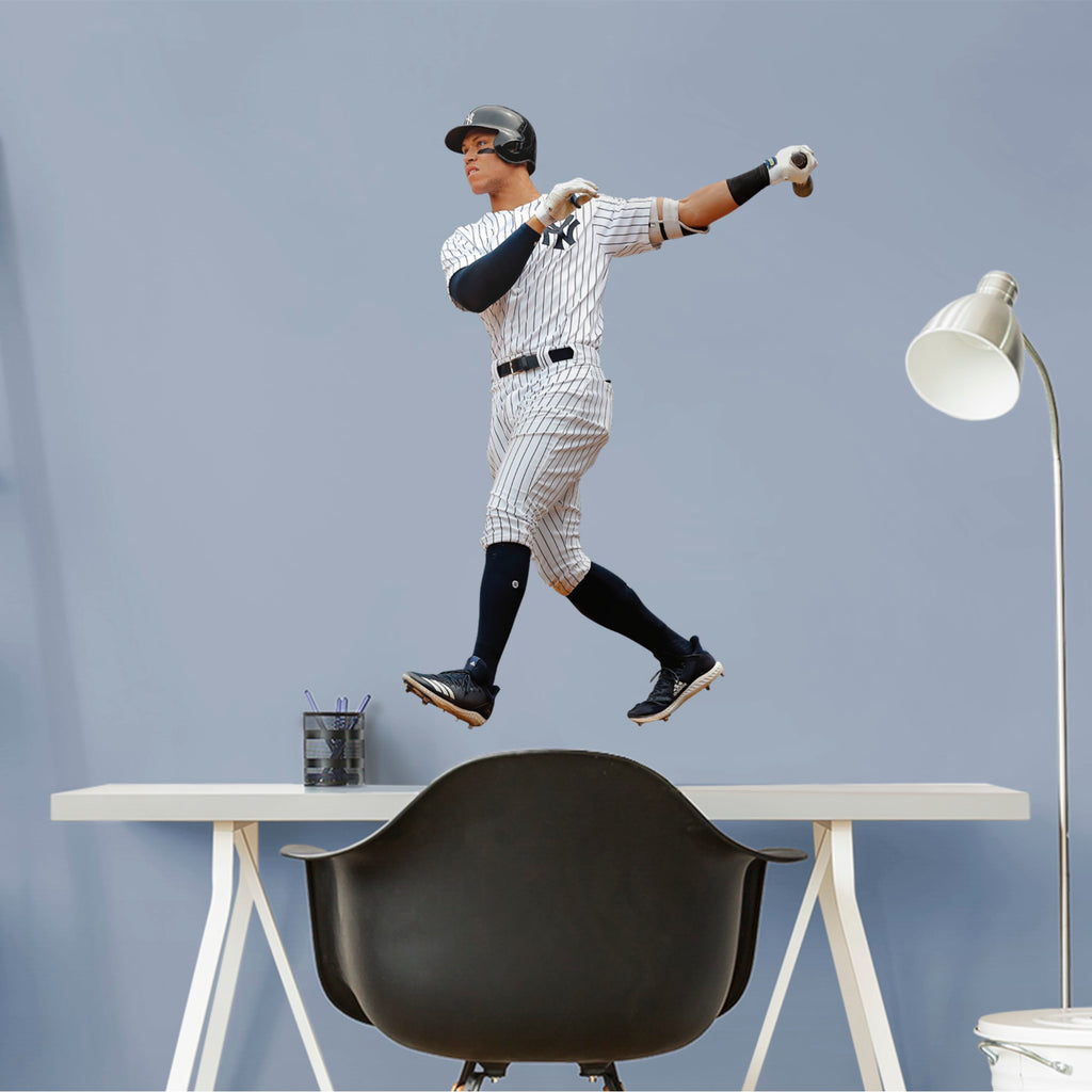 Baseball fans and Yankees fanatics alike love 2017 Rookie of the Year Aaron Judge, and now you can bring him to life in your own home with this Removable Wall Decal! This decal is vibrant and durable and is sure to bring some of that Yankees magic to any room in your home.