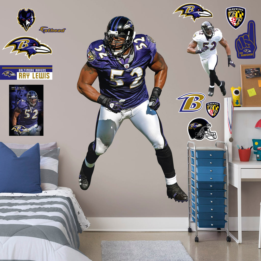 Life-Size Athlete + 12 Decals (47"W x 78"H) He's the second linebacker ever to win the NFL's Super Bowl MVP Award, and now, Brickwall, a.k.a. Ray Lewis, is ready for the bedroom, living room or locker room. This rugged, removable wall decal features the full figure of two-time Super Bowl champion No. 52 in his black, purple and metallic gold Baltimore Ravens best. Go Ravens!