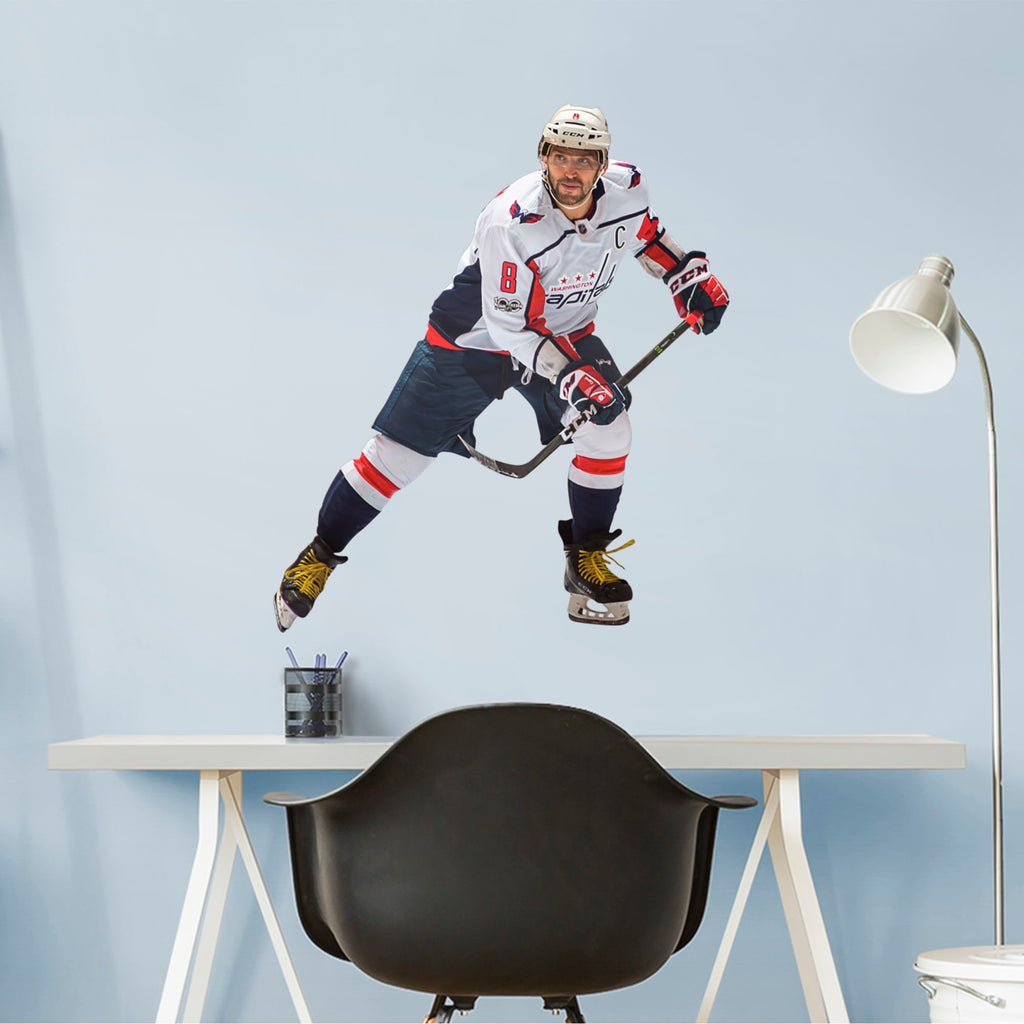 NHL fans and Capitals fanatics alike love Alex Ovechkin, the clutch captain from Washington D.C., and now you can bring his skill to life in your own home! Seen here in action on the ice, this durable and bold removable wall decal will make the perfect addition to your bedroom, office, fan room, or any spot in your house!